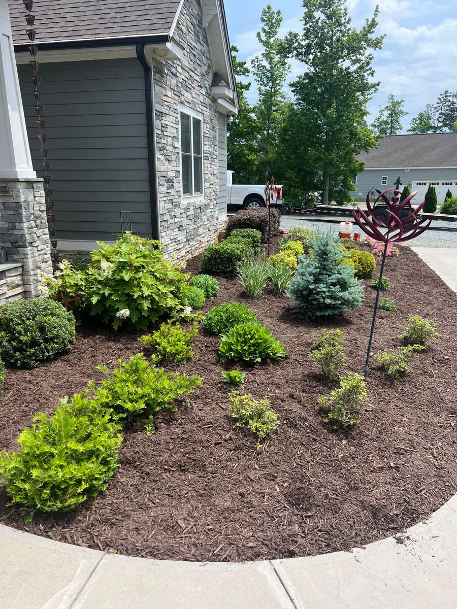 Mulch Installation for KM Landworks in Moncure ,  NC