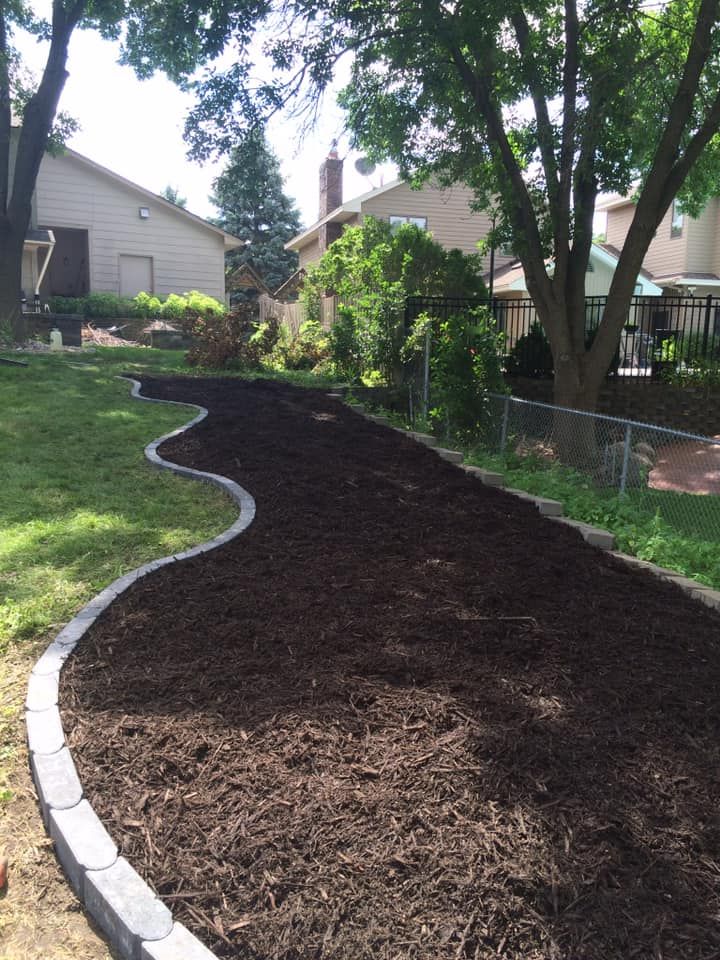 Mulch Installation for Keane Lawn Care & Snow Removal in Spring Lake Park, MN