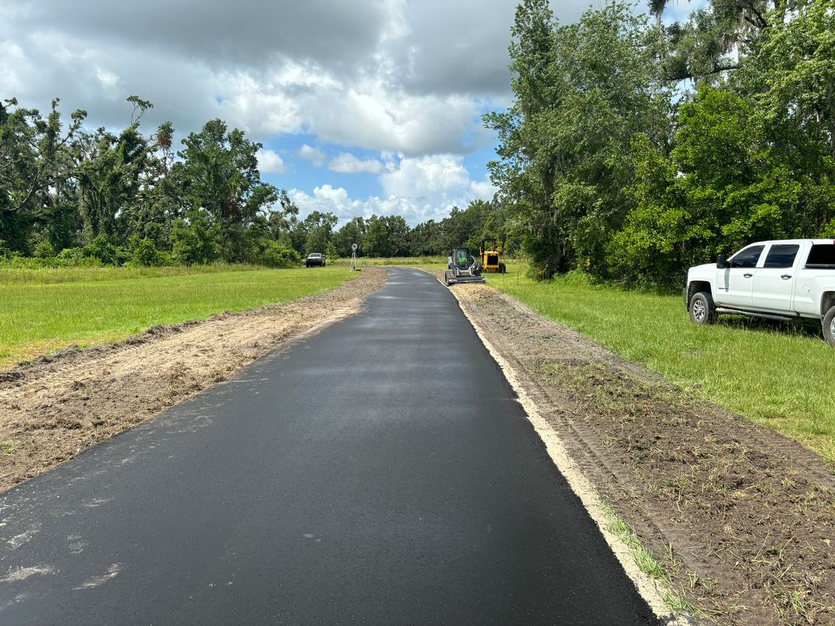 Asphalt Driveway Installation for Lamar Construction in North Central, FL