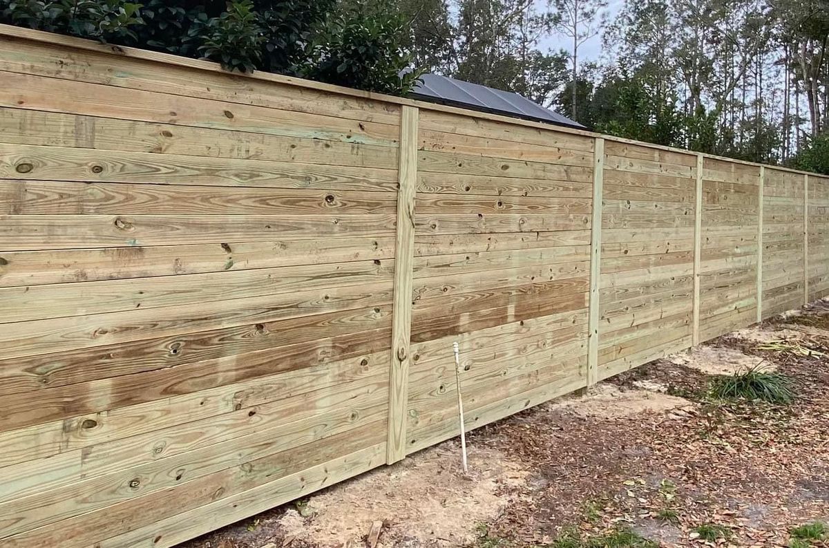 Wood Fence Installation for Madden Fencing Inc. in St. Johns, Florida
