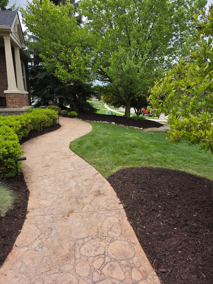 Mulching for Ivy Lawn and Landscaping in Oxford, MI