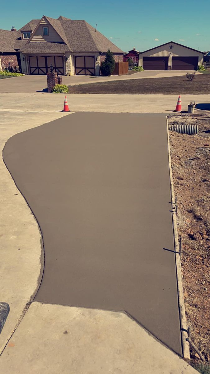 Concrete Driveway Installation for Project X Construction LLC in Tulsa, OK