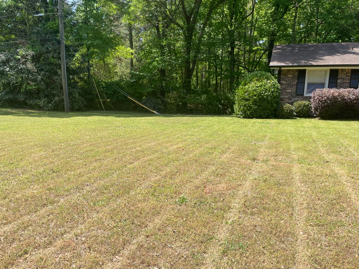 Mowing for Clark's Cuts Lawn Care in Lilburn, GA