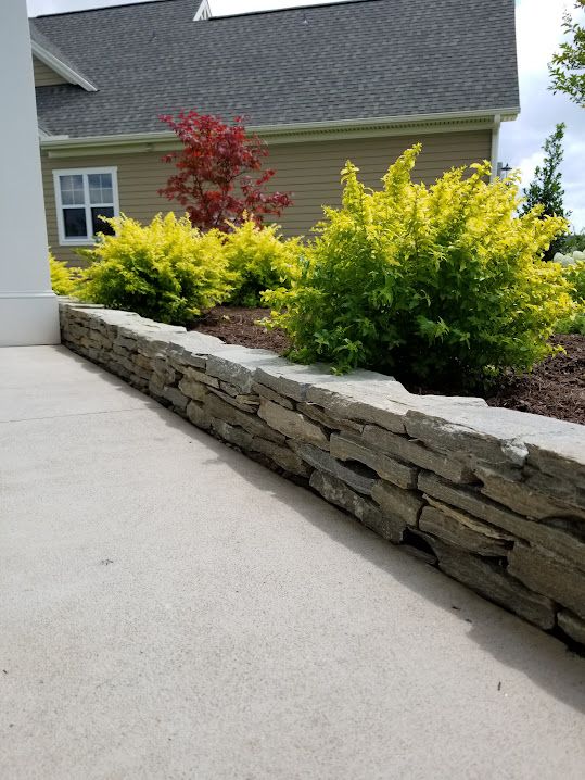 Flower Bed & Rock Work for Bianchi Construction Company Inc in Southport, NC