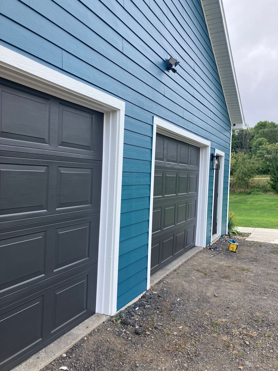 Siding, Windows, Doors, and painitng for Third Gen Construction LLC  in Cortland, NY