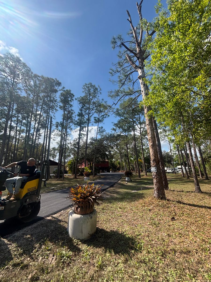 Asphalt Parking Lot Construction for Stanley & Sons Pavement in Naples, FL