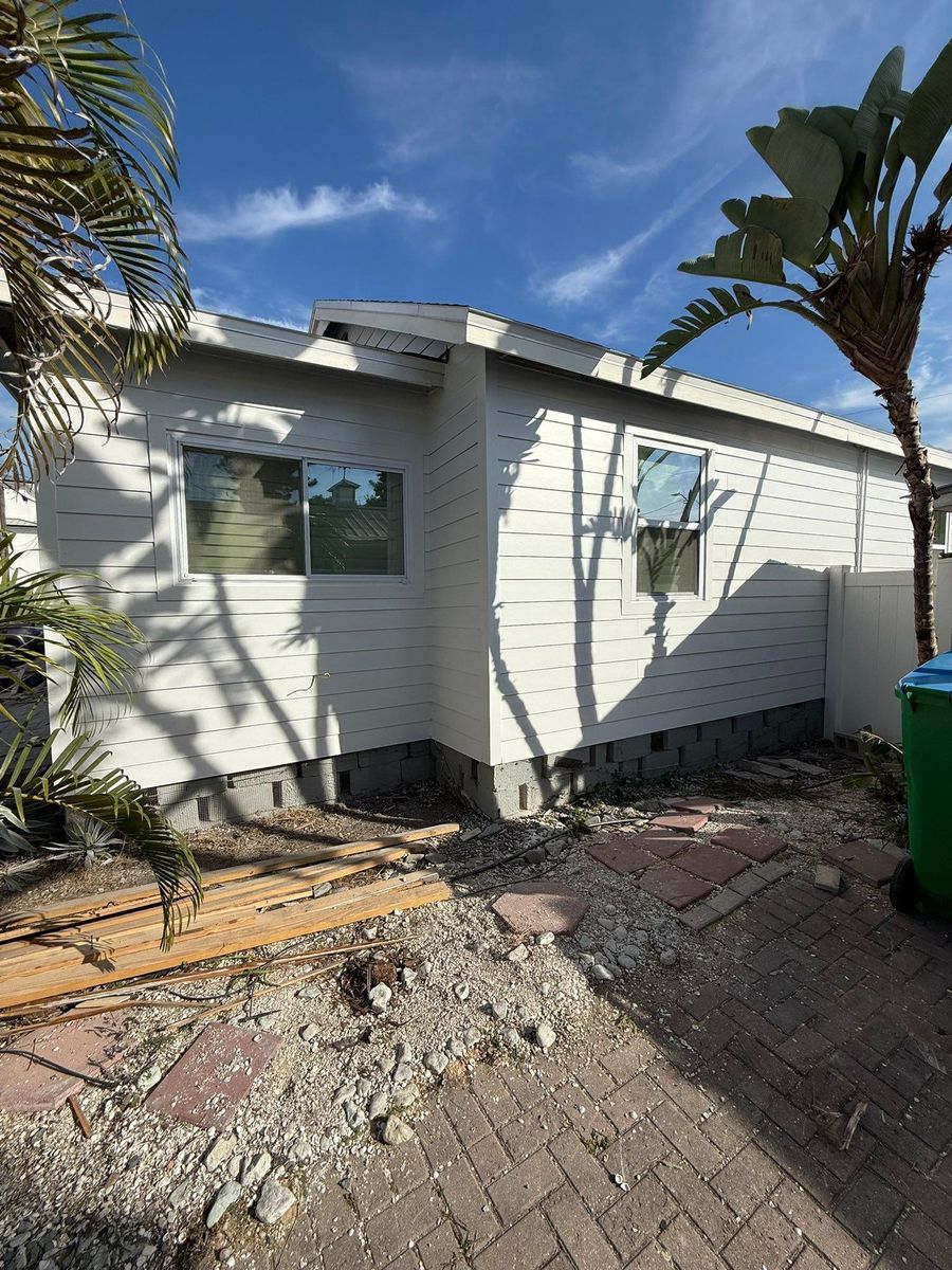 Hardie Siding Installation for Escorpio Painting in Tampa, FL