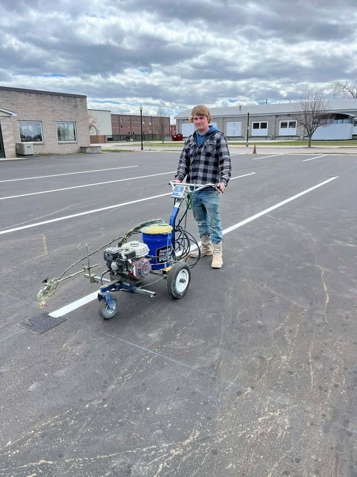 Striping for 45th Parallel Sealcoating in Alpena, MI