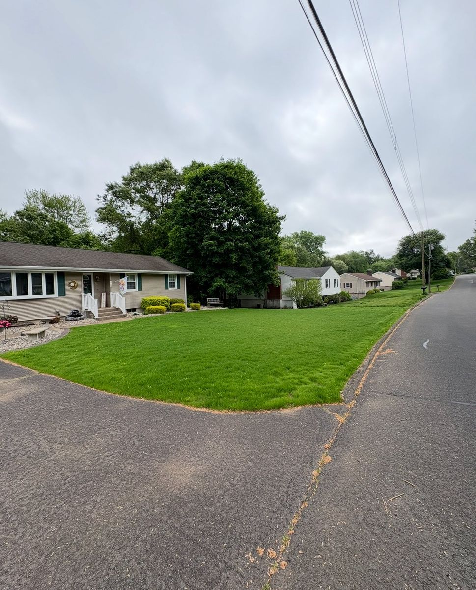 Lawn Aeration for Chapman's Lawn & Landscape in Ellington, CT