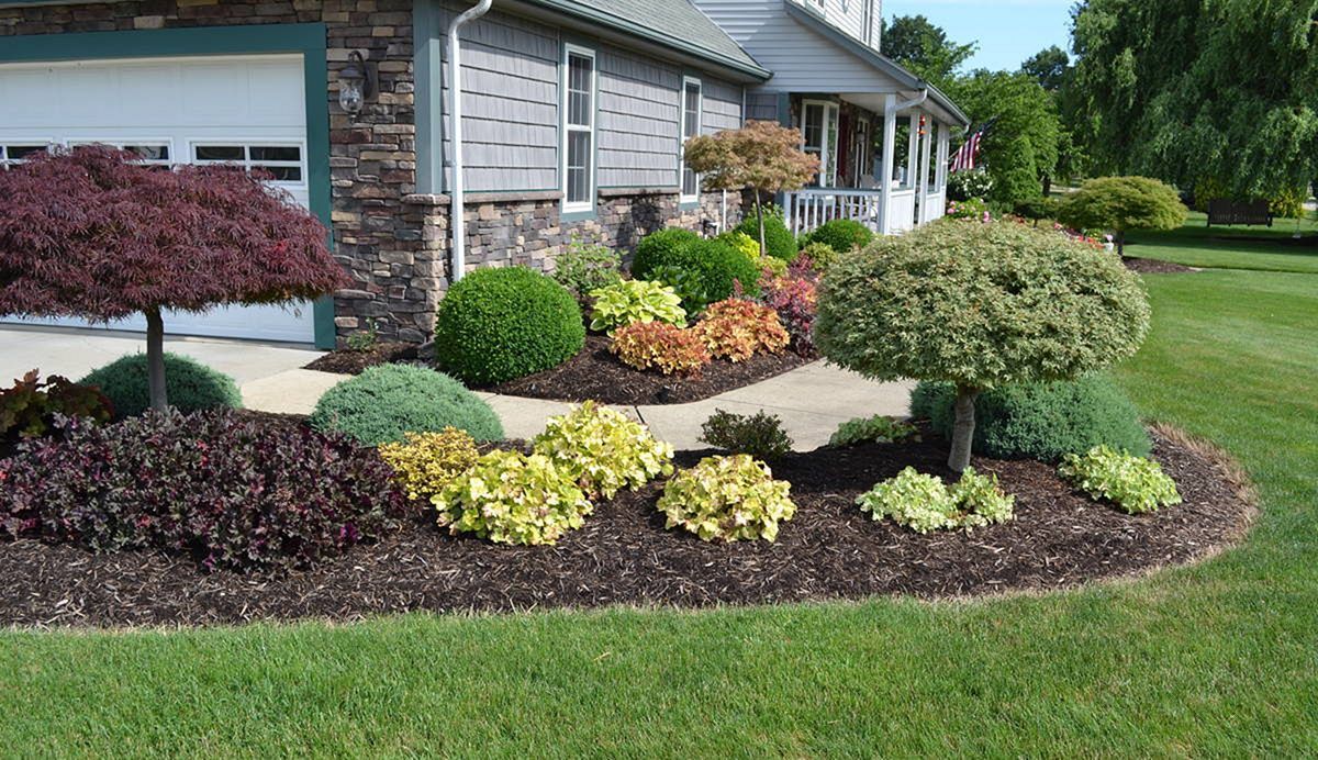 Mulch Installation for Rey Landscaping & Lawn service LLC in West Palm Beach,  FL