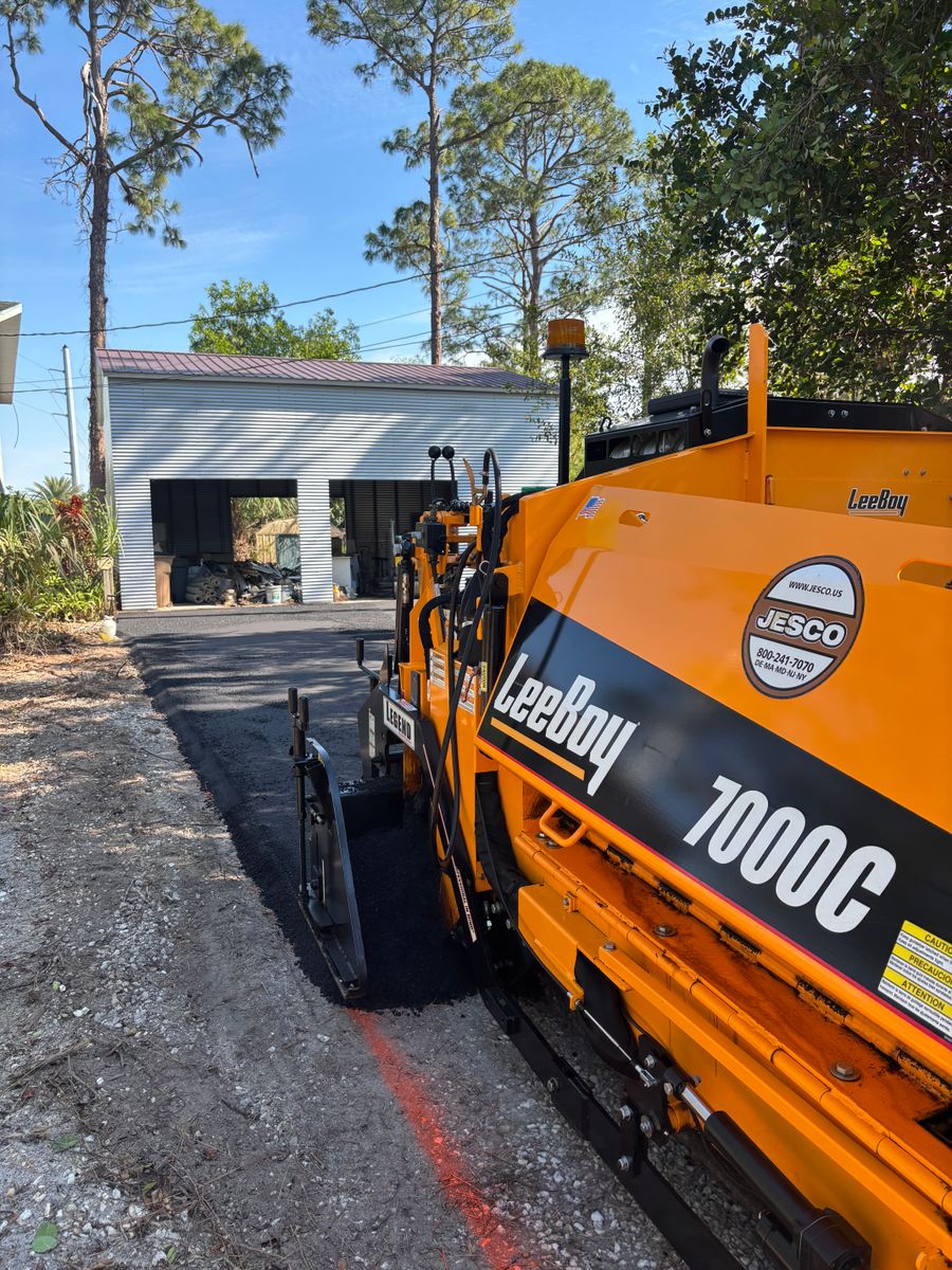 Asphalt Parking Lot Construction for Stanley & Sons Pavement in Naples, FL