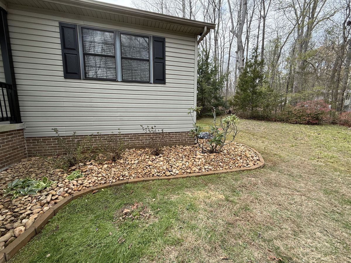 Rock insallation for Wesleys Landscaping in Clinton, TN