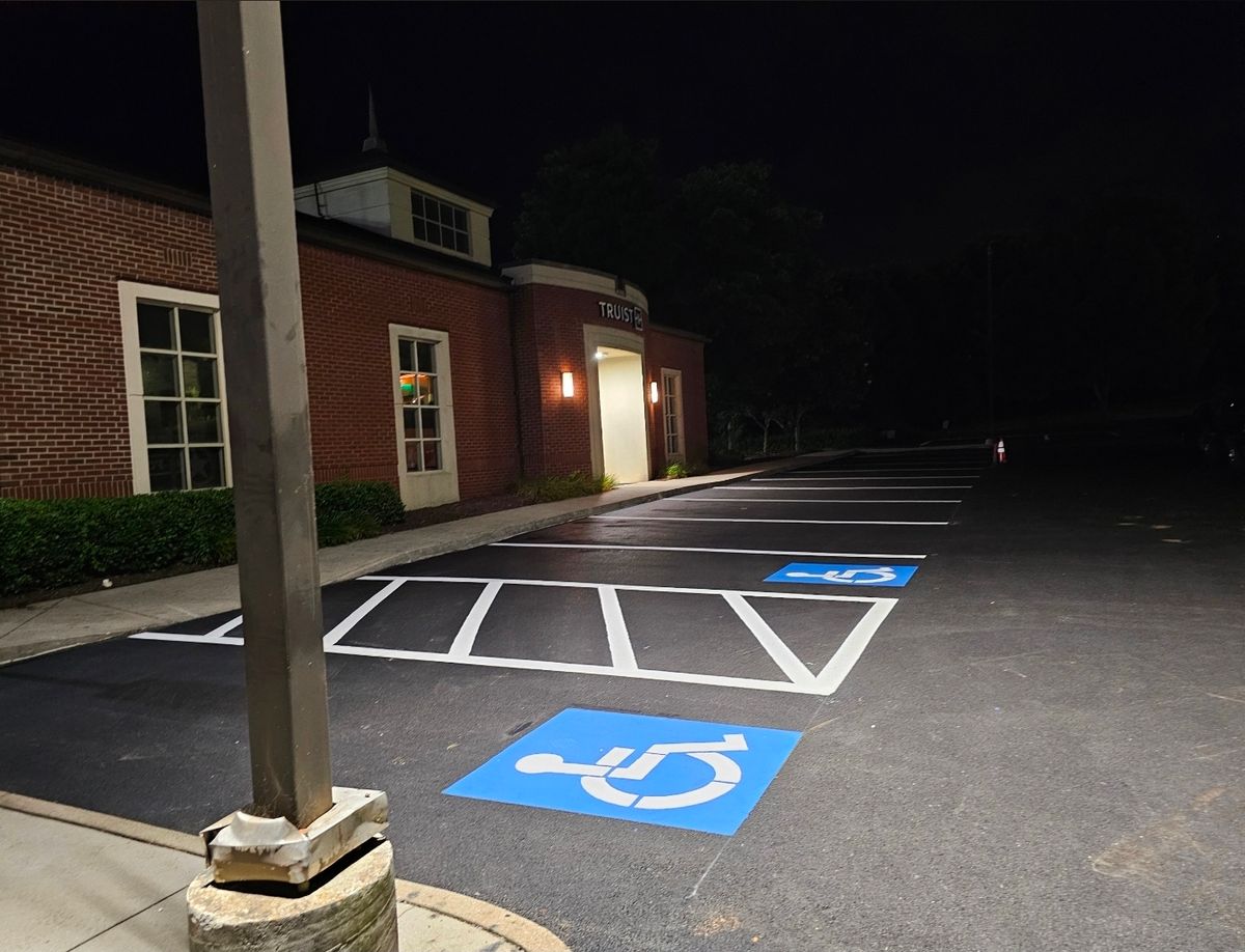 Signage for Stripe A Lot in Knoxville, TN