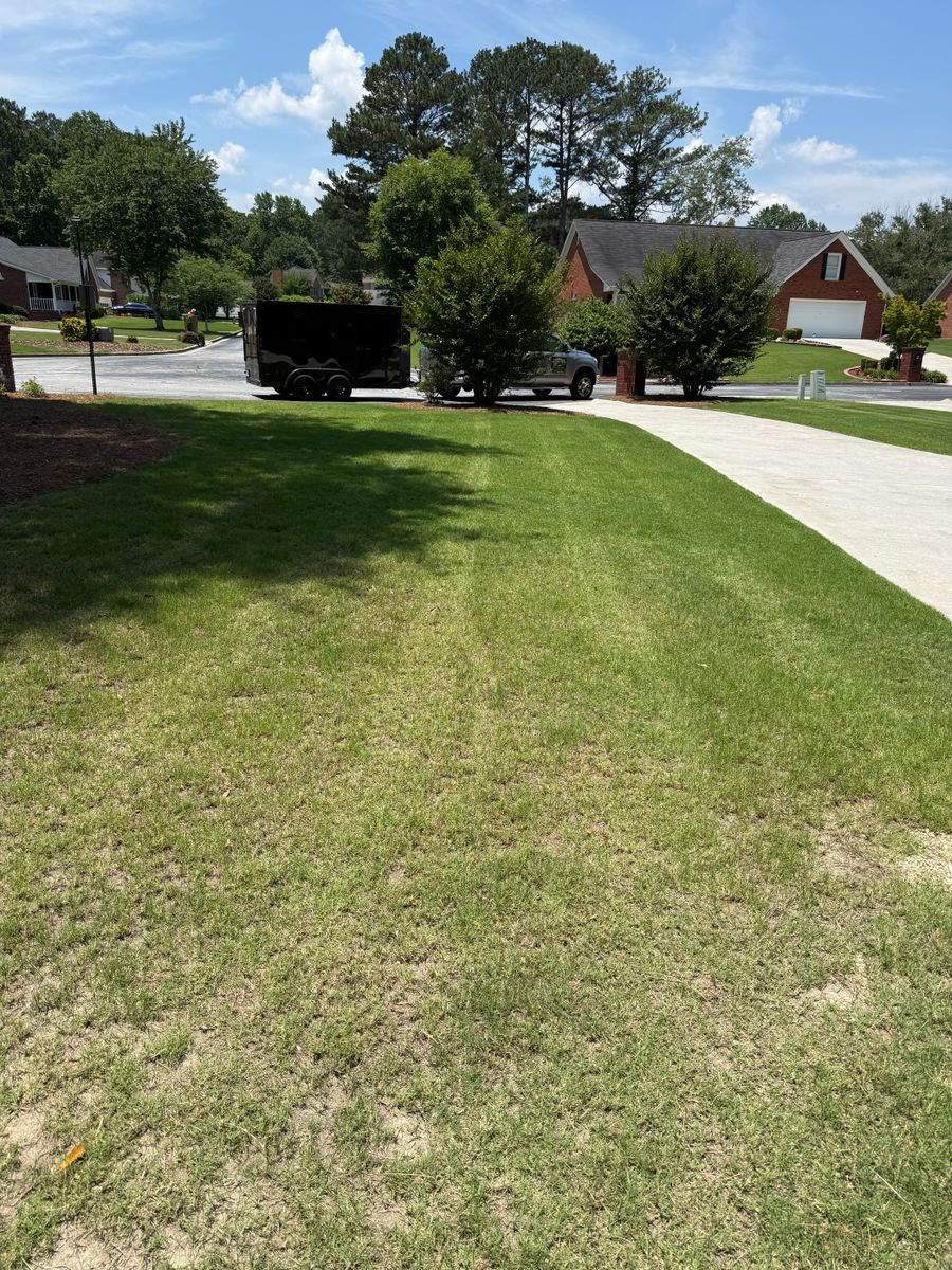 Mowing for Clark's Cuts Lawn Care in Lilburn, GA