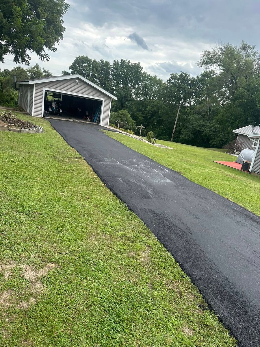 Asphalt Driveway Installation for Bishop Asphalt Sealcoating in Marceline, MO