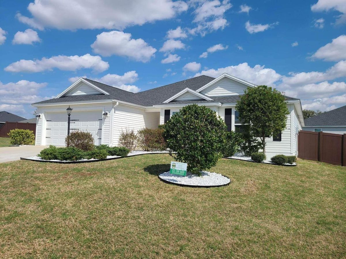 Mulching for Village Lawn Services LLC in Lake Panasoffkee, FL