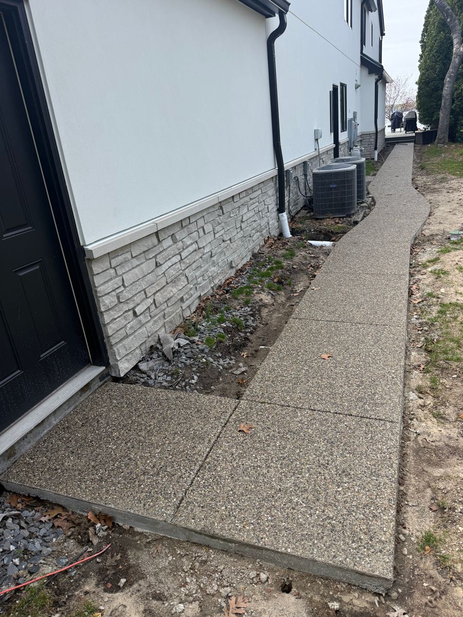 Concrete Sidewalk Installation for Deerbrook Construction in Pontiac, MI