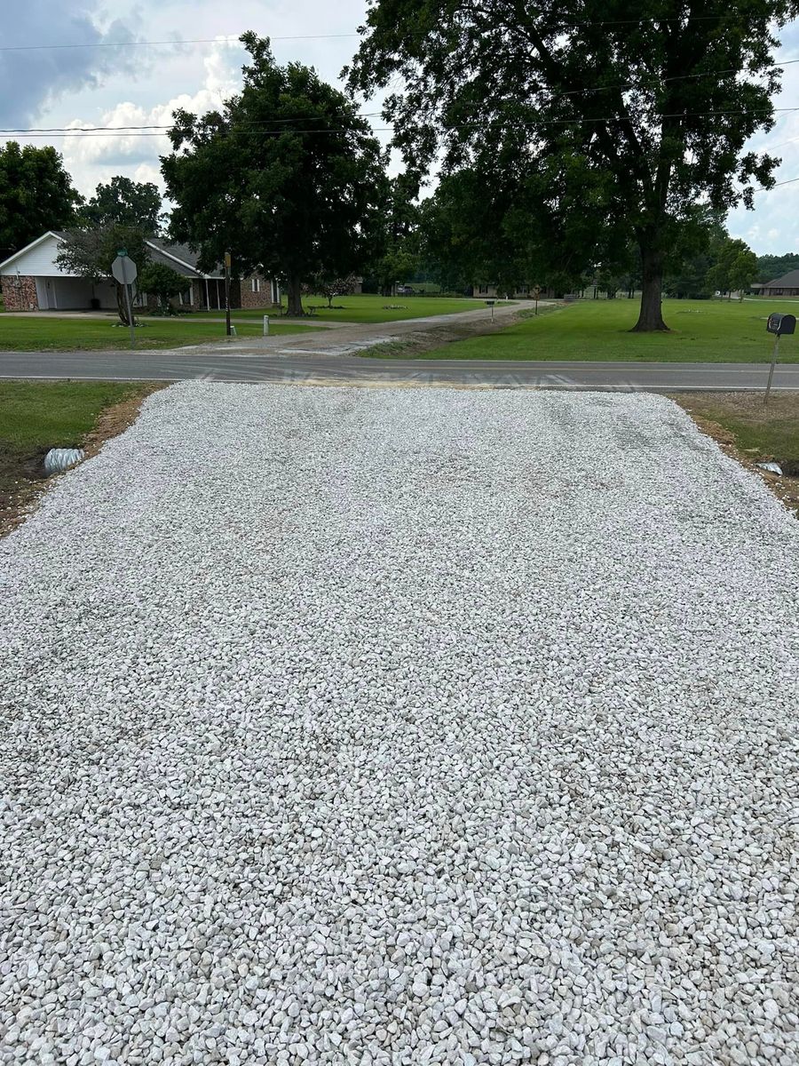 Limestone & Concrete Wash Installation for Lambert Equipment Services in Hessmer, LA