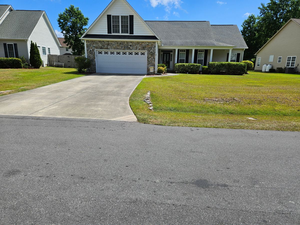 Walkway and driveway cleanup for Just Mow and Go Lawn Service, LLC in New Bern, NC
