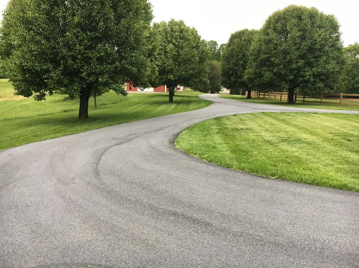 Mowing for El Perico Tree Service and Lawn Care, LLC in Boonville, North Carolina