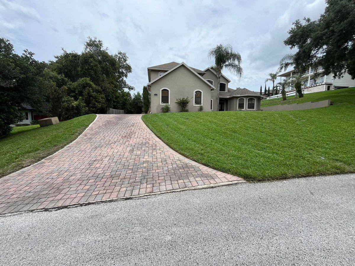 Mowing for Fix It Manny in Clermont, FL