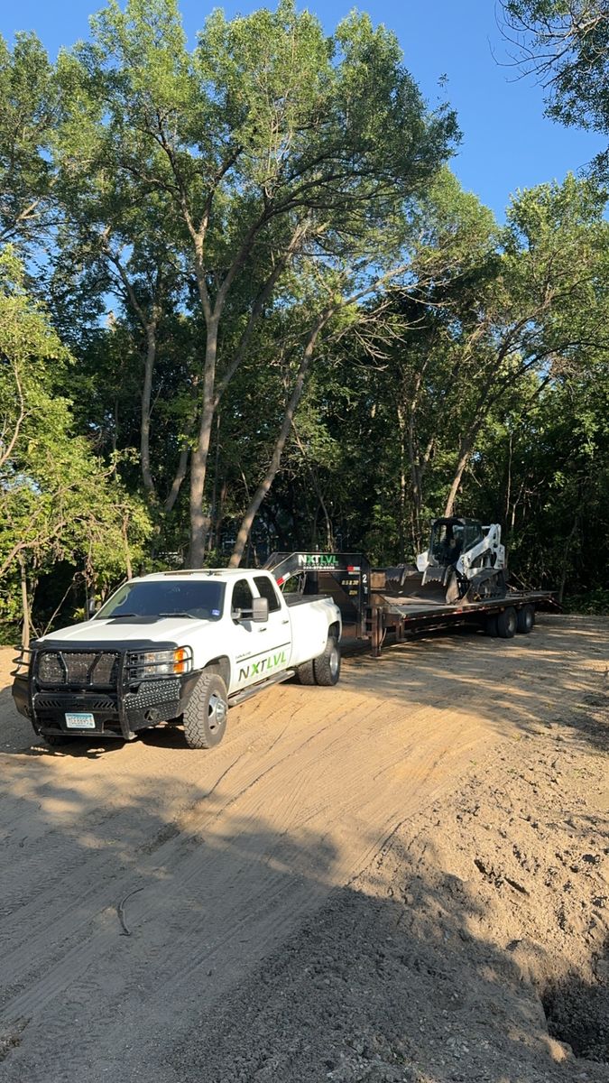 Land clearing for NXT LVL Excavating in New London, MN