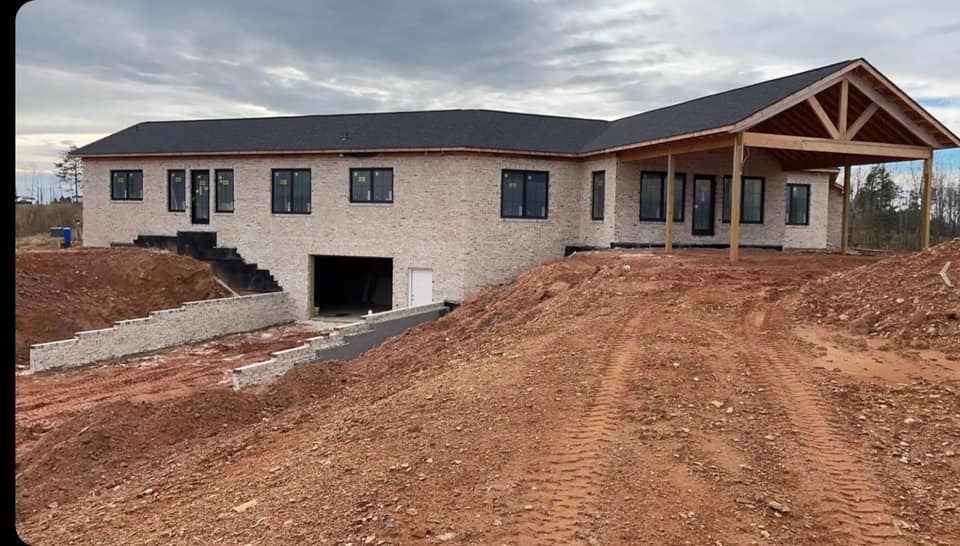 Retaining Wall Construction for Smith’s Custom Brick & Stone in Kernersville, NC