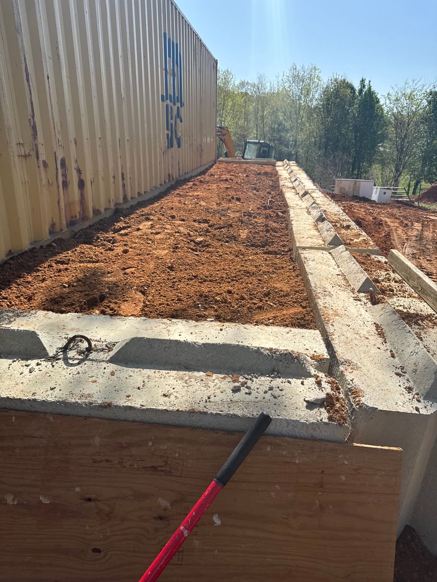 Foundation And basement Digging for Simmons land works in Sardis,, TN