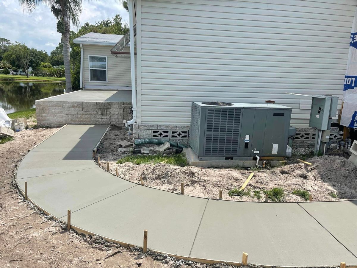 Sidewalk Installation for Florida Universal Concrete in Lakeland, FL