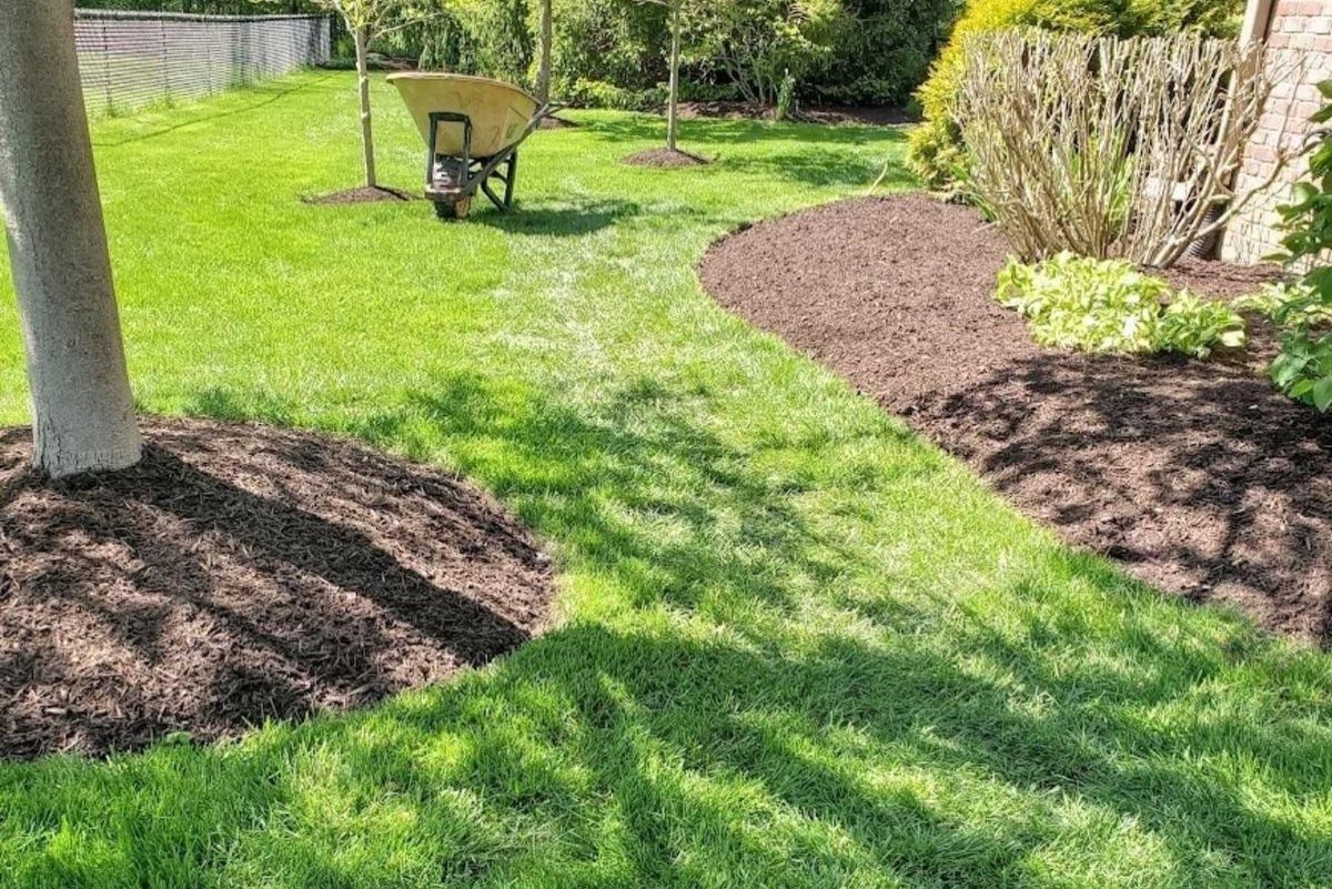 Mulching and pine needling for Holloway Yard Company in Greensboro, NC