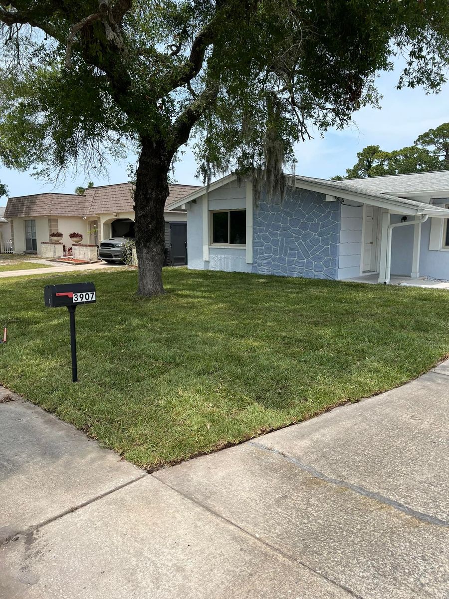 Mowing for Perfect MOs Landscaping in Hudson, FL