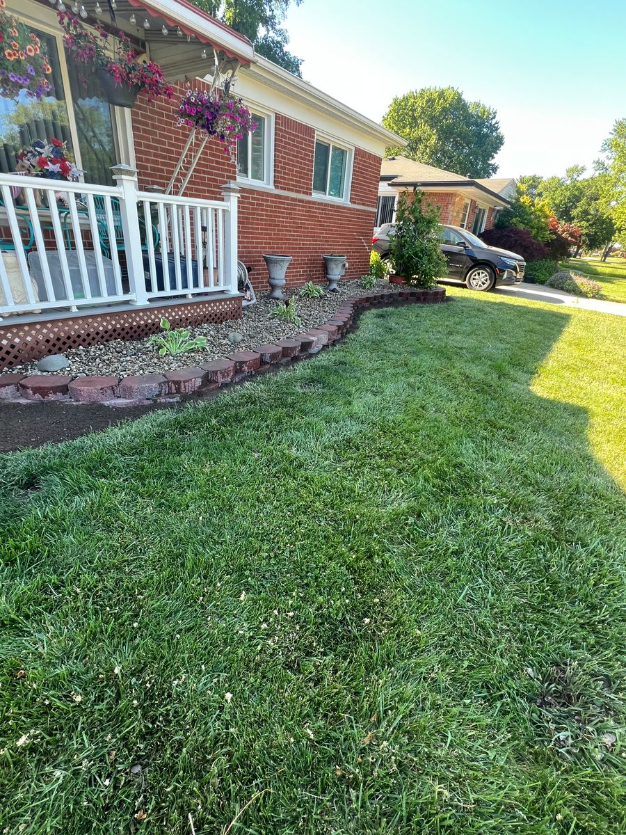Decorative stone/Mulch Installation for Alltimate Outdoor Services in Warren, MI