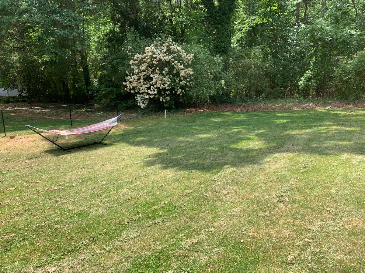 Mowing for Clark's Cuts Lawn Care in Lilburn, GA