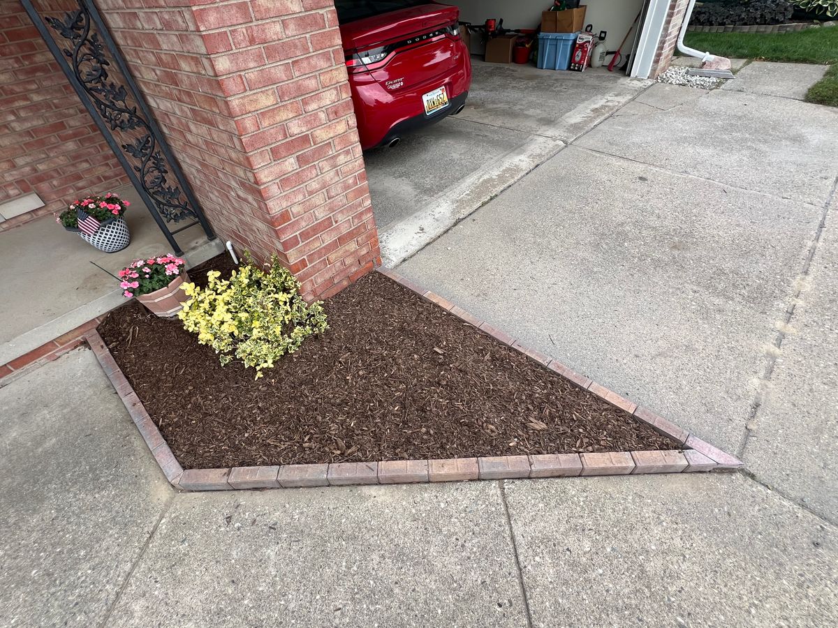 Decorative stone/Mulch Installation for Alltimate Outdoor Services in Warren, MI