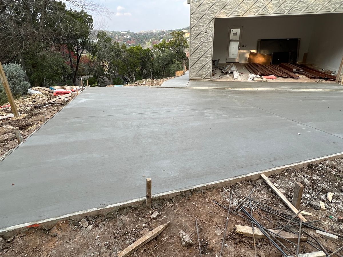 Concrete Driveway Installation for Leo's Concrete Crew in Elgin, TX