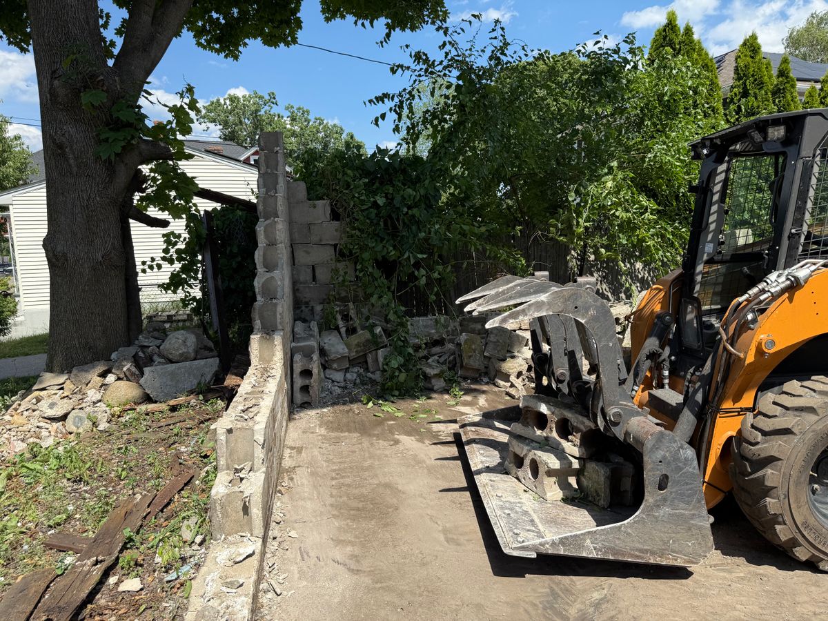 Garage demolition for Quality Demo Services LLC in Lawrence, MA