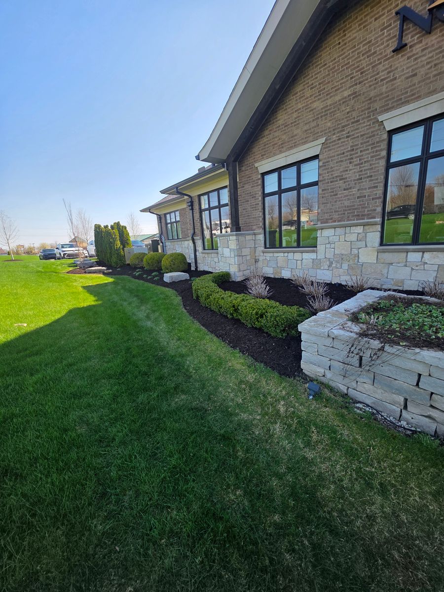Flower bed Maintenance for Ivy Lawn and Landscaping in Oxford, MI