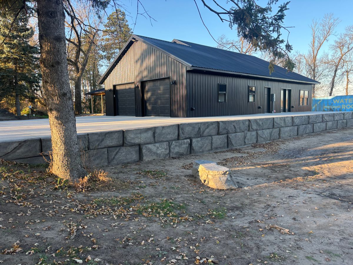 Sidewalk Installation for STAMPEDE Vertical Concrete in Isanti, Minnesota
