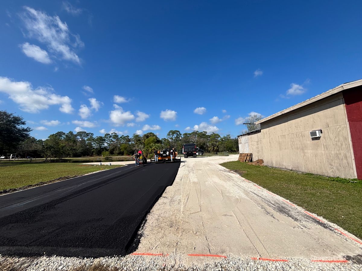 Asphalt Parking Lot Construction for Stanley & Sons Pavement in Naples, FL