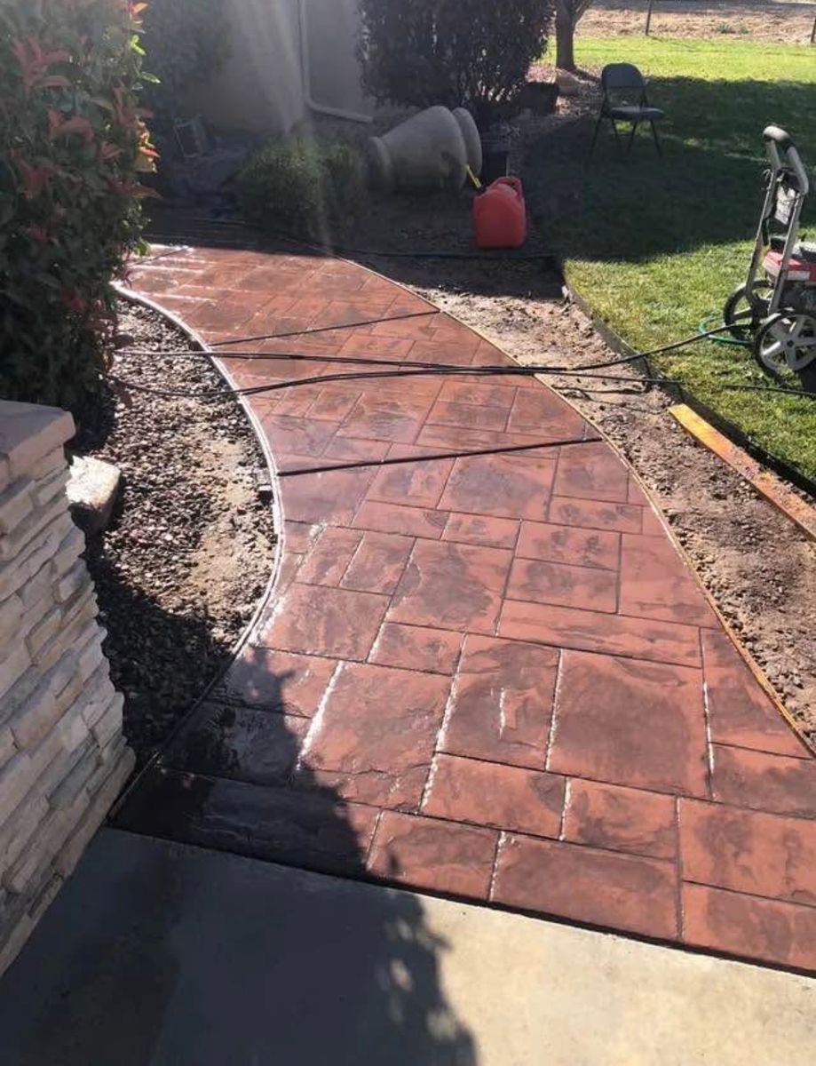 Stamped & Stained Concrete accents for Oasis Landscaping LLC in El Paso, TX