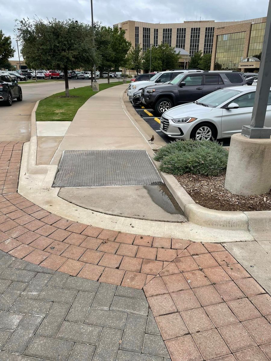 Commercial ADA Ramps, Sidewalk, Parking Bollards w/Signage, Curb/Gutter, Parking Lot Repair for Crete-Fleet in Abilene, TX