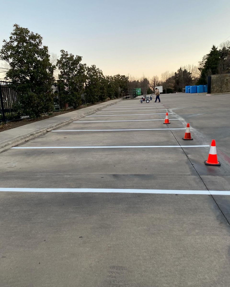 Asphalt Parking Lot Construction for Landmark Pavement Solutions in Dallas, TX