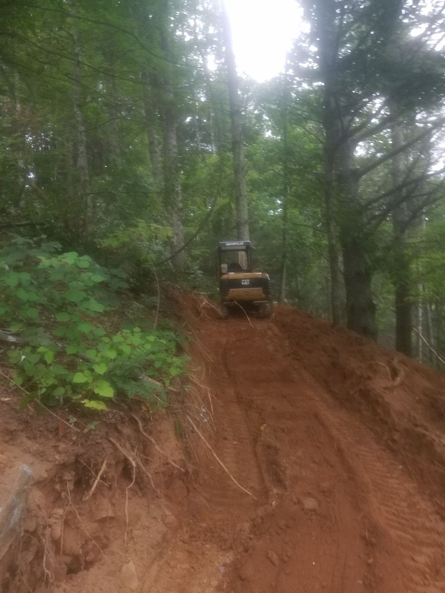 Drain Cleaning for Quality Land Management and septic service in Green Mountain, NC