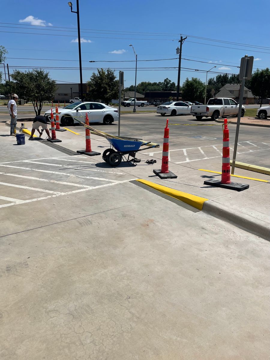 Commercial ADA Ramps, Sidewalk, Parking Bollards w/Signage, Curb/Gutter, Parking Lot Repair for Crete-Fleet in Abilene, TX