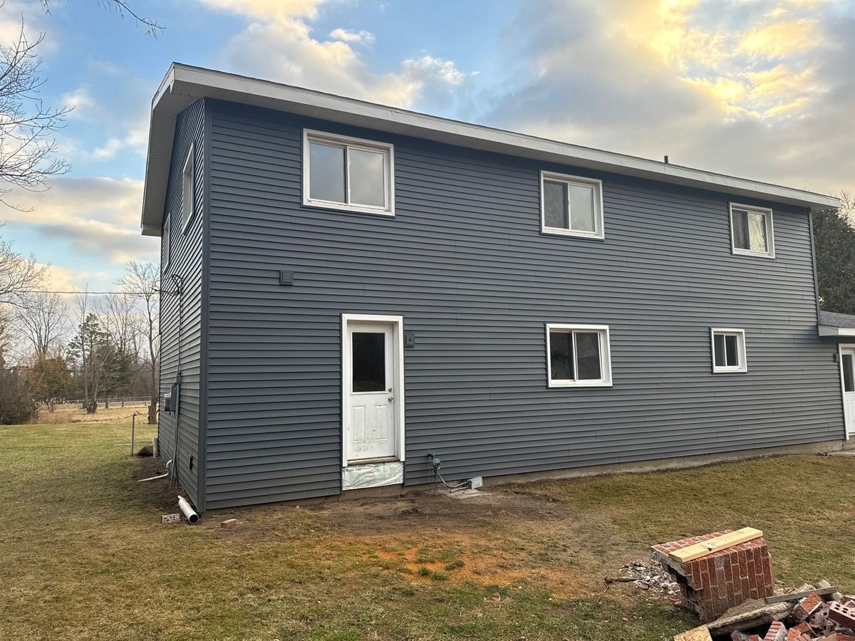 Siding for Walkers Quality Roofing  in Midland, MI