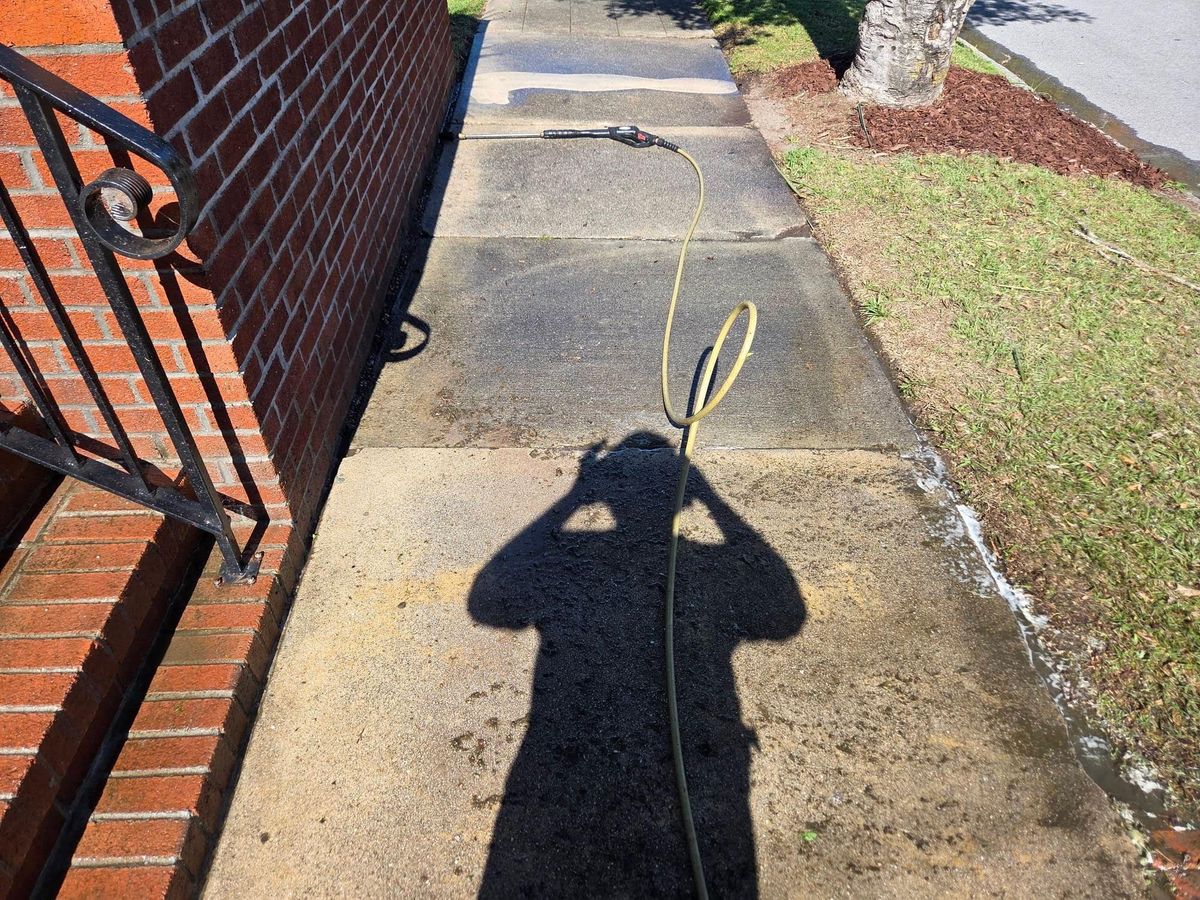 Walkway and driveway cleanup for Just Mow and Go Lawn Service, LLC in New Bern, NC