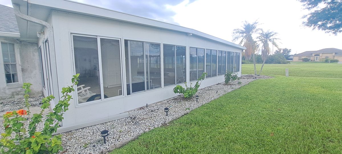 Caulking windows for Perfection Custom Painting LLC in Punta Gorda, FL