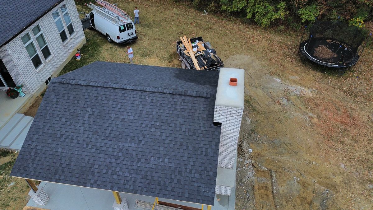 New construction roof installation for Precious Roofing in Madeira, OH