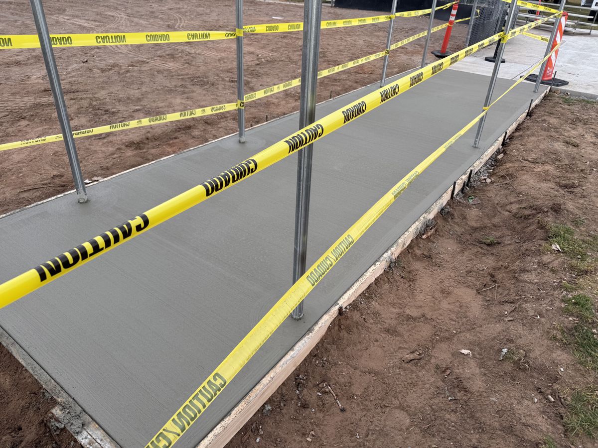 Sidewalk Installation for TNT Concrete and Construction in Roy, UT