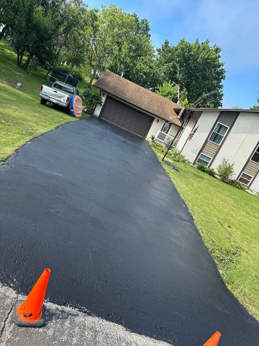 Asphalt Driveway Installation for Bishop Asphalt Sealcoating in Marceline, MO